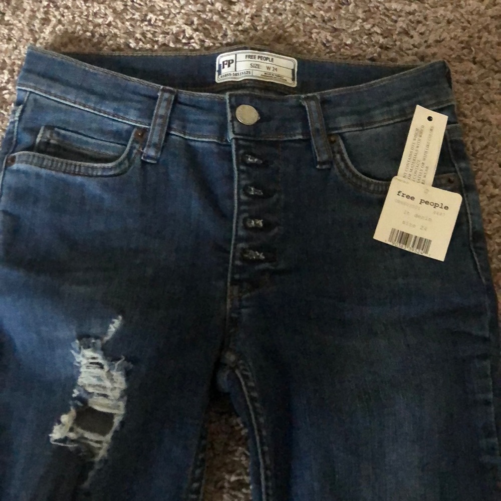Free people New w/tags distressed jeans.